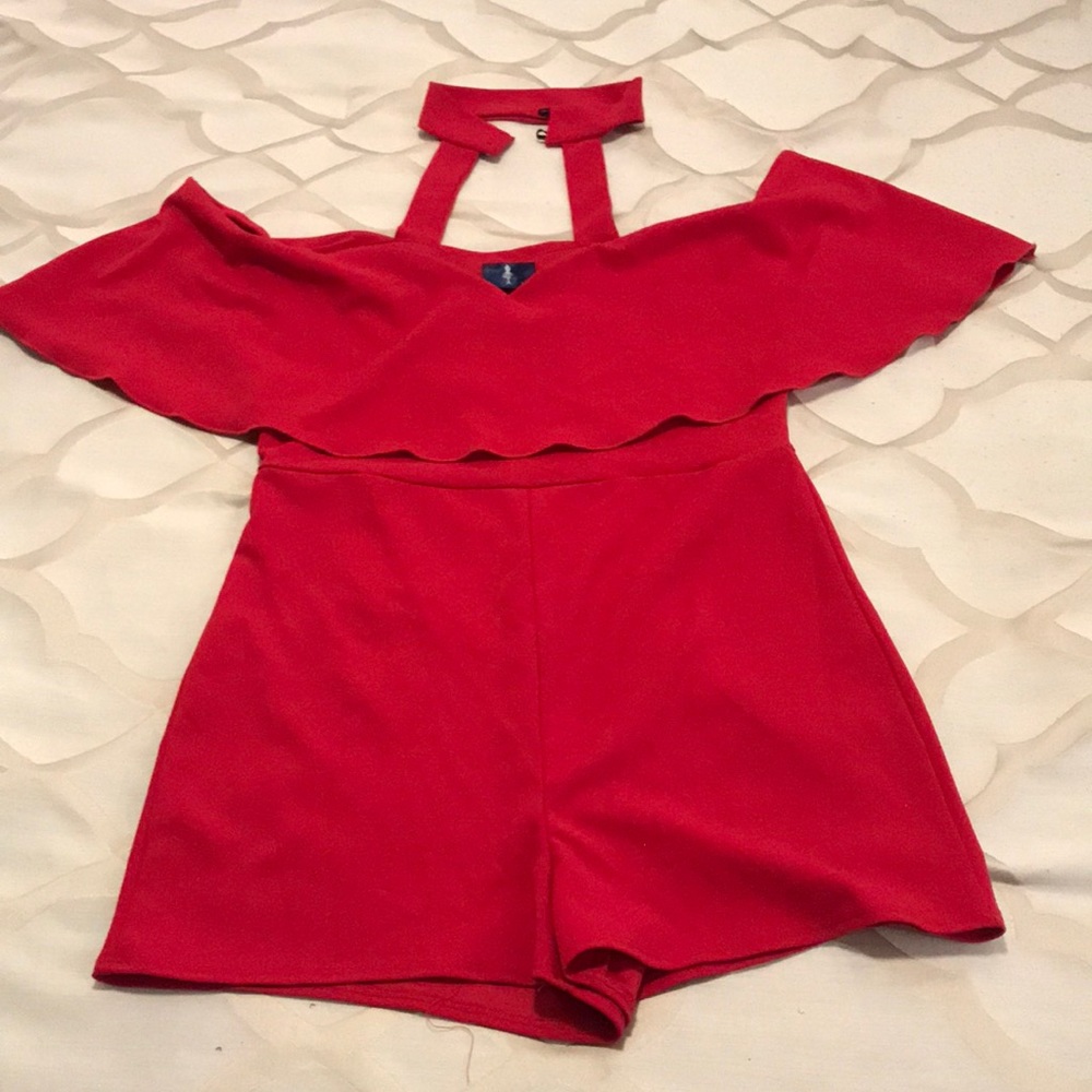 Romper w/ choker and V neck line.